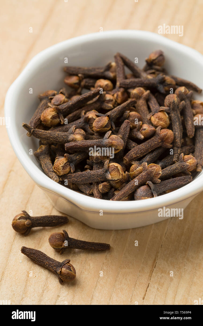 Bowl with aromatic dried cloves Stock Photo