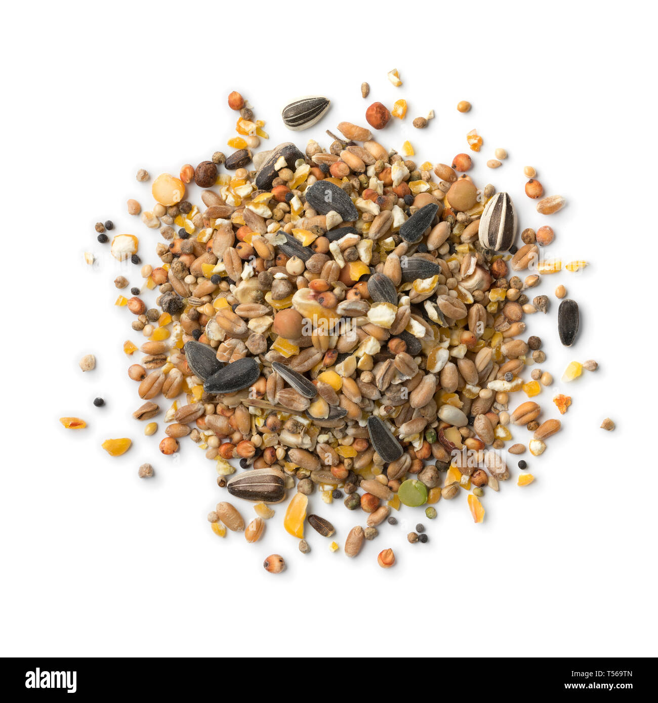 Heap of bird food mixture  isolated on white background Stock Photo