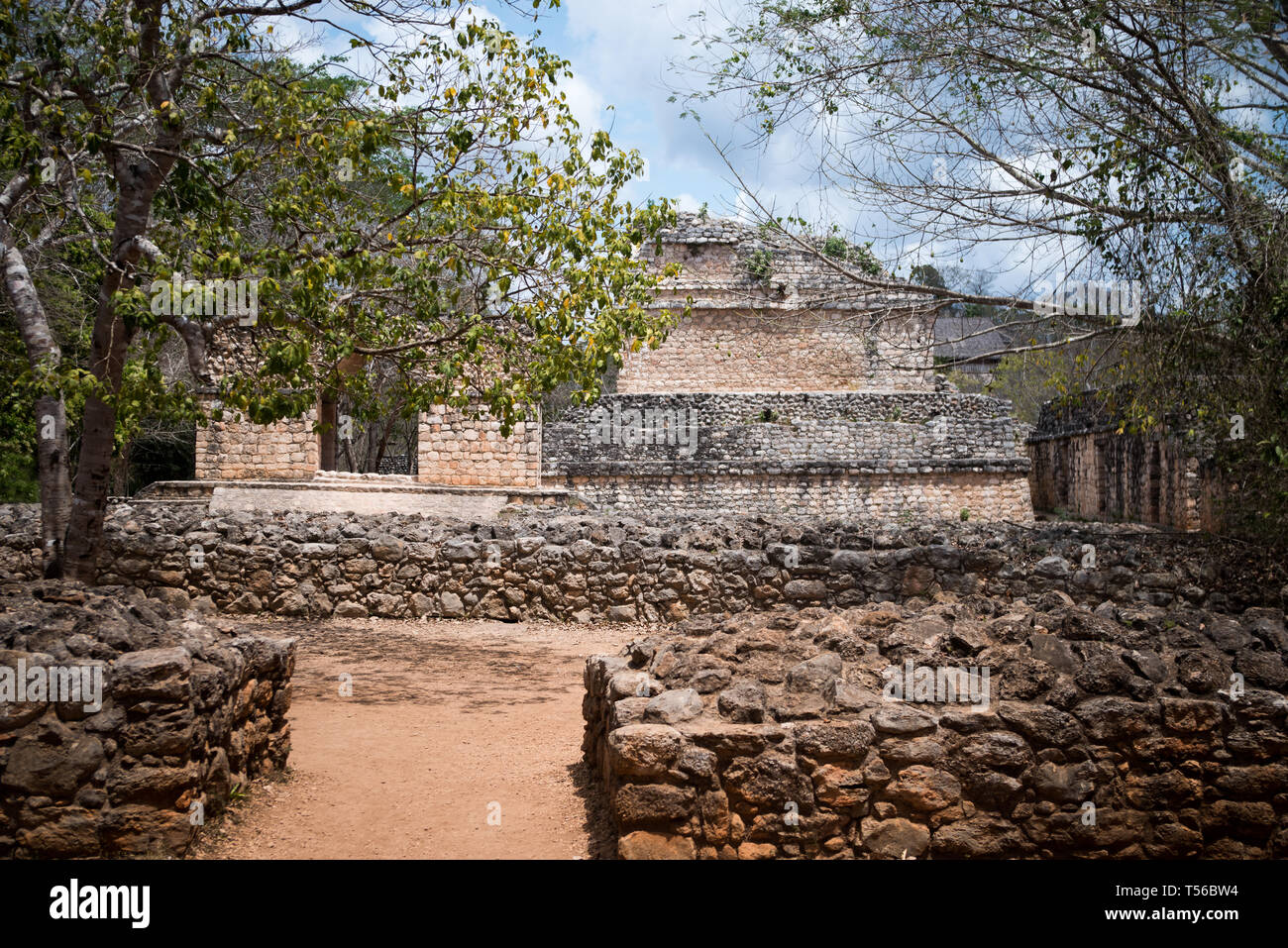 Gate to Maya Ek Balam with the foundations of the defensive walls Stock Photo