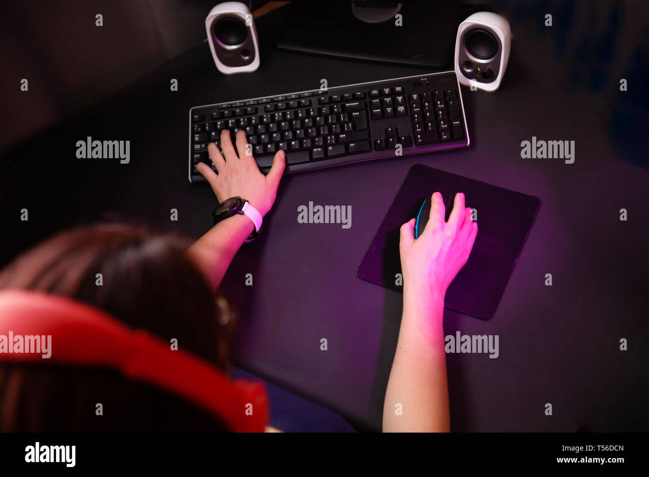 Female hands playing computer game with mouse and keyboard Stock Photo ...