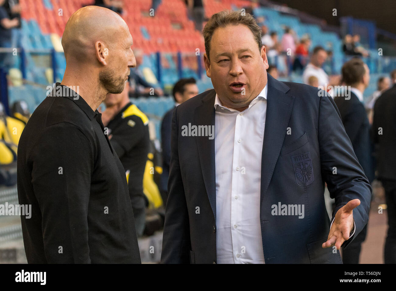 20th of april 2019 Arnhem, The Netherlands Soccer Dutch Eredivisie Vitesse v PEC Zwolle   Eredivisie 2018-2019 L-R Jaap Stam of pec zwolle, Leonid Slutskiy of vitesse Stock Photo