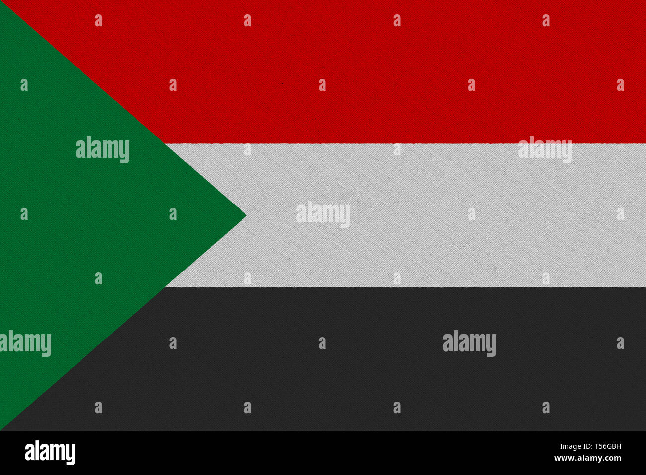 Sudan fabric flag. Patriotic background. National flag of Sudan Stock Photo