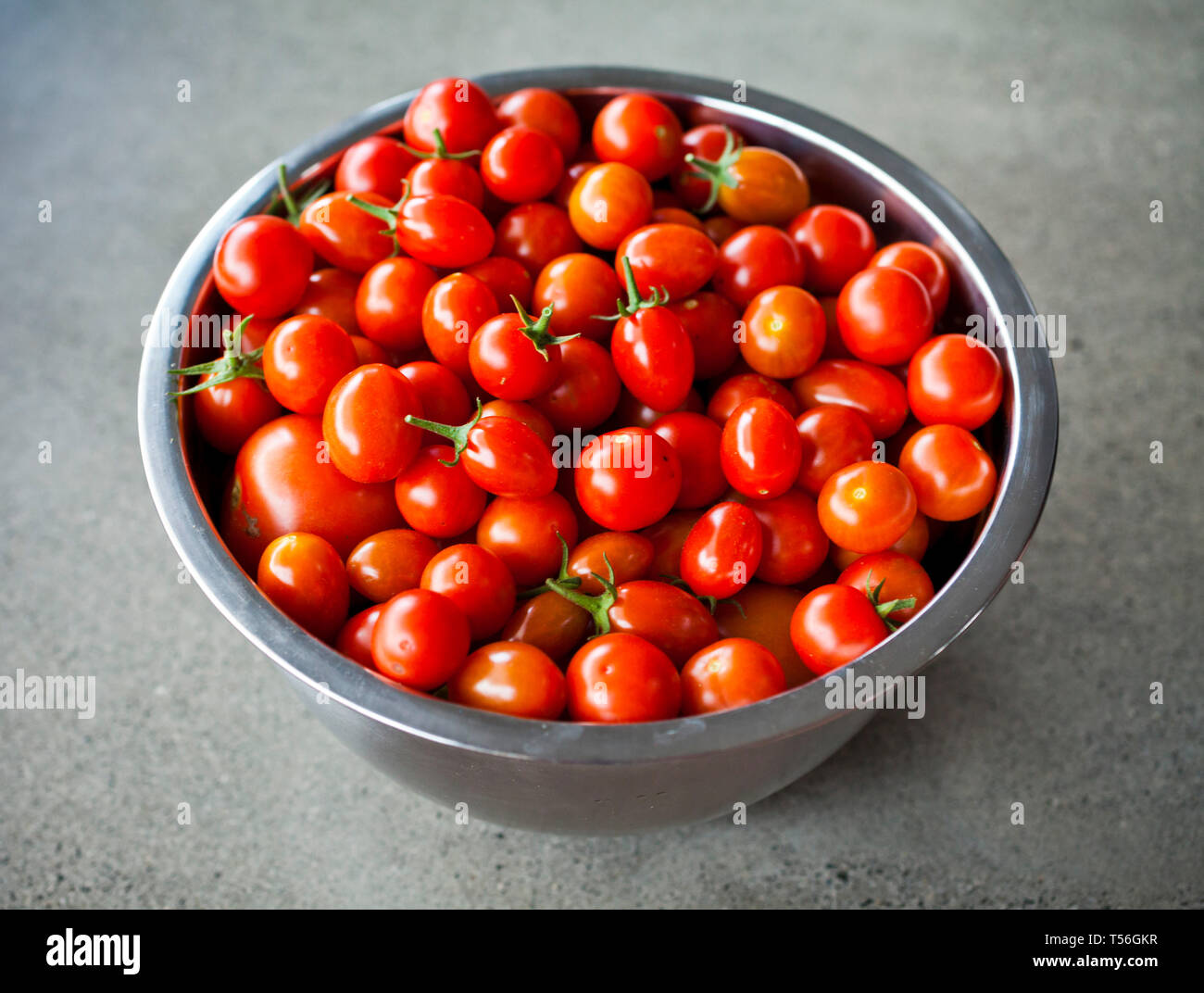 Ripe red fresh home grown cherry tomatoes Stock Photo