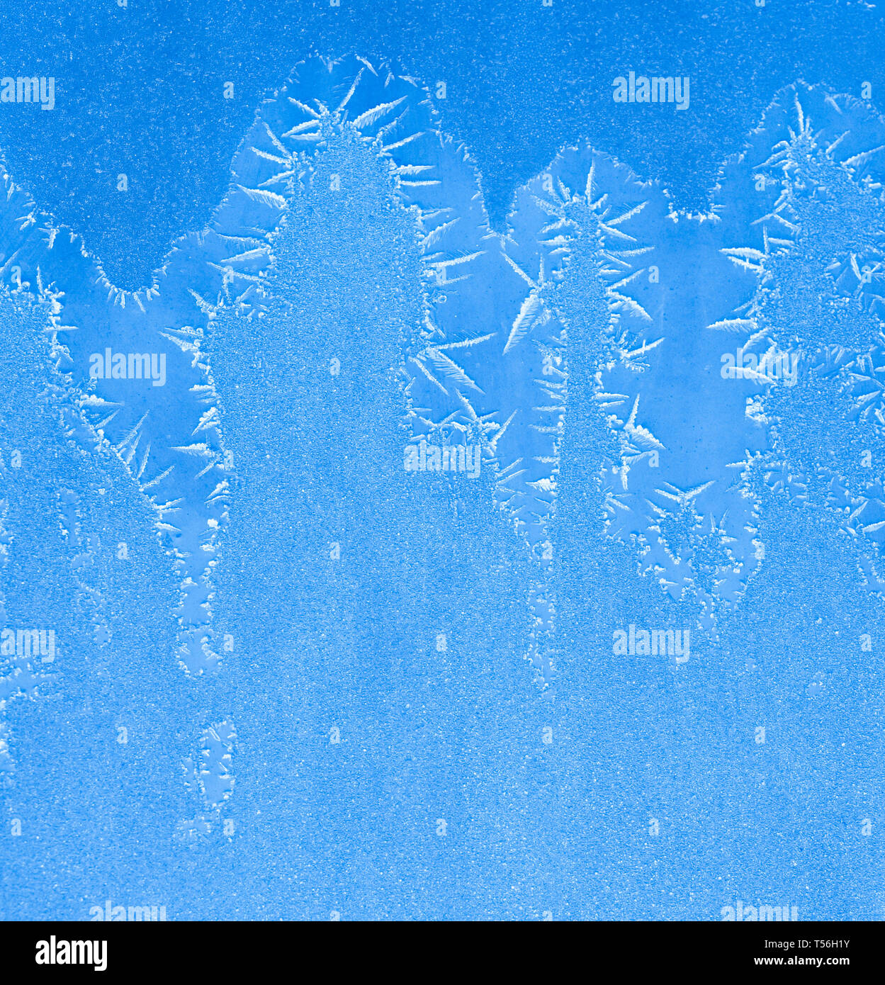 Cold blue frosty winter textured ice background Stock Photo - Alamy