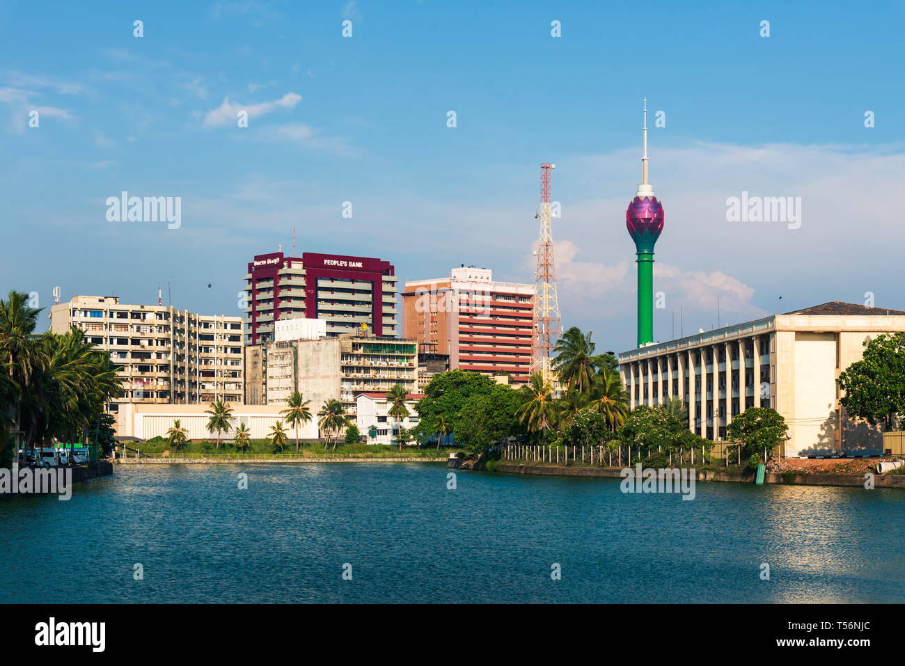 Colombo, Sri Lanka - April 5, 2019: Colombo skyline over Beira lake with modern business and residential buildings in the capital city of Sri Lanka Stock Photo