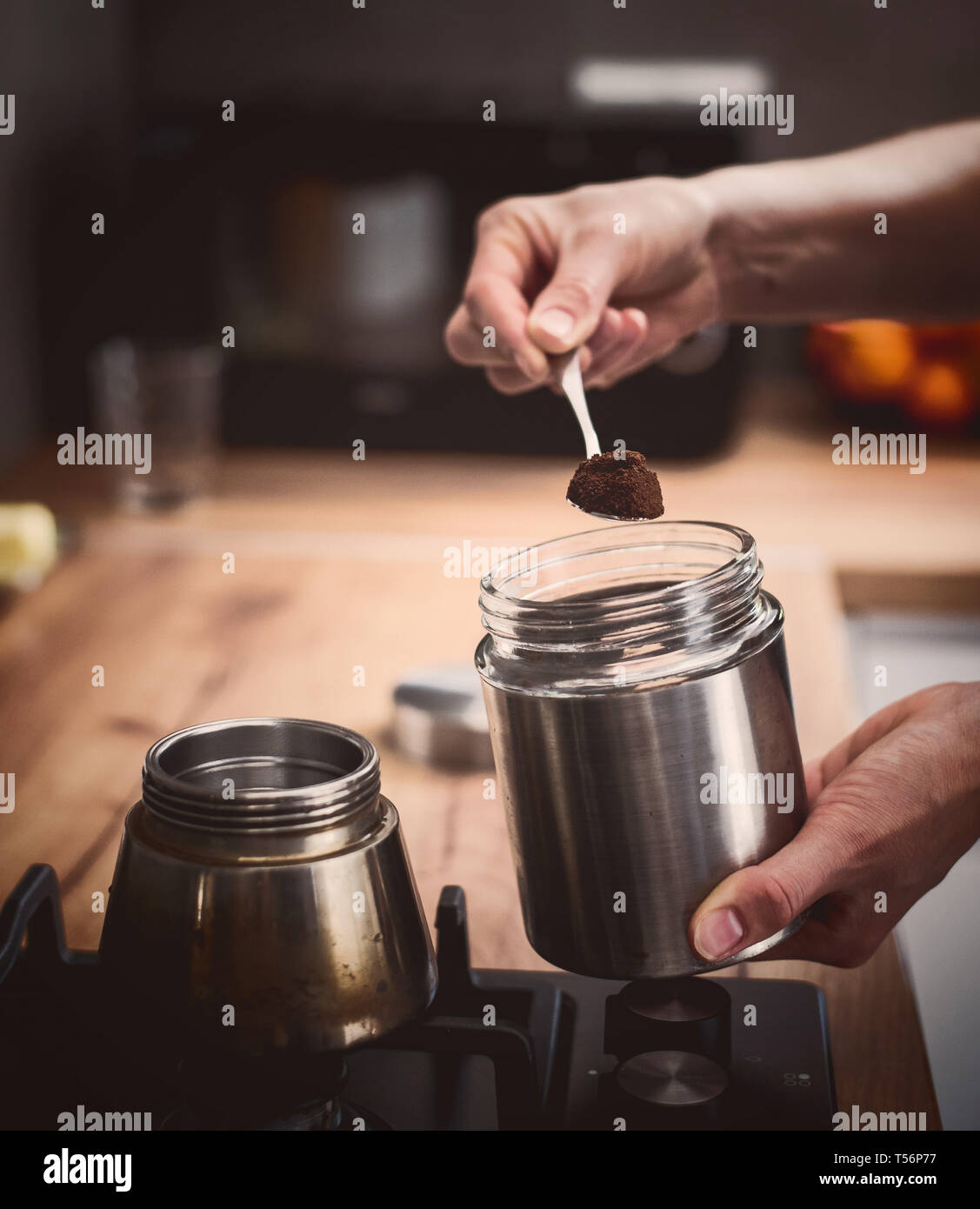 Preparing a traditional italian style coffee with coffee percolator