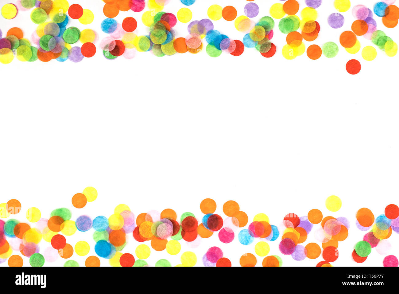 Multicolored confetti frame isolated on white background. Stock Photo