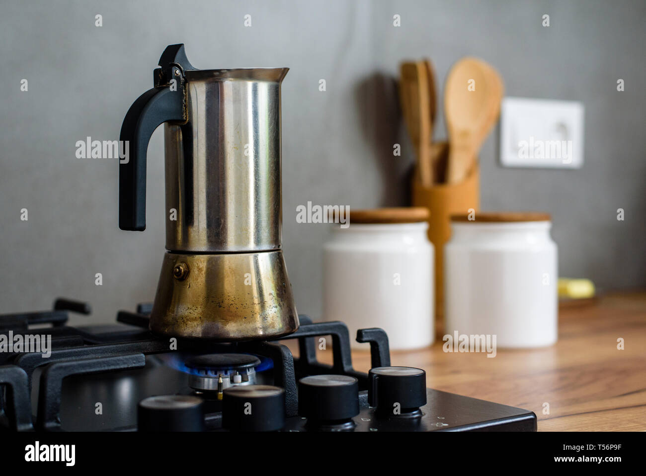 Preparing a traditional italian style coffee with coffee percolator