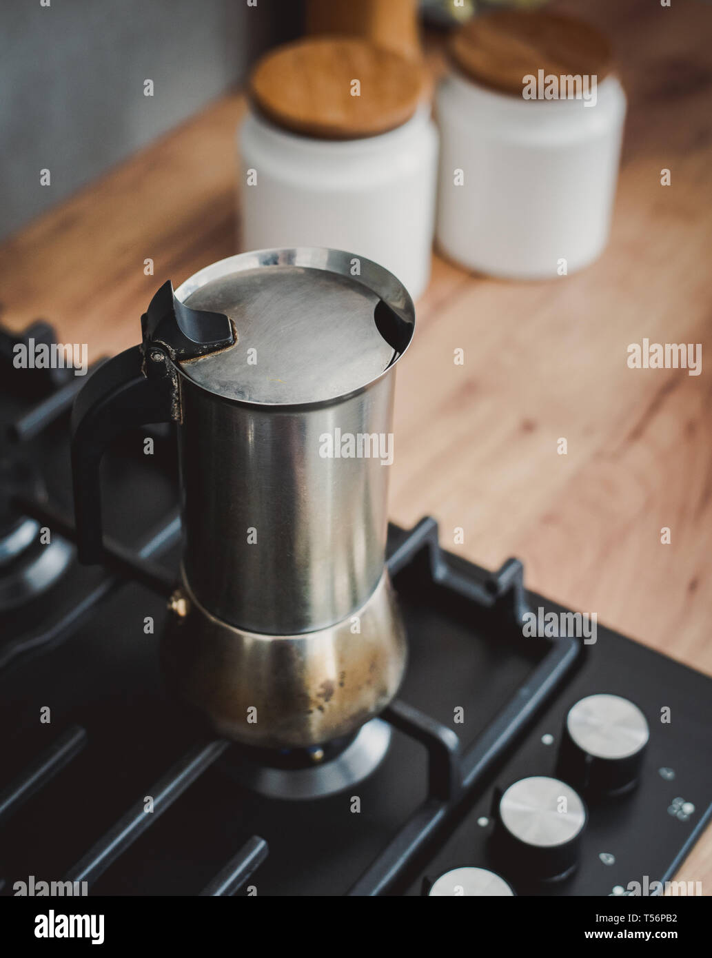 Preparing a traditional italian style coffee with coffee percolator. Making a coffe Stock Photo