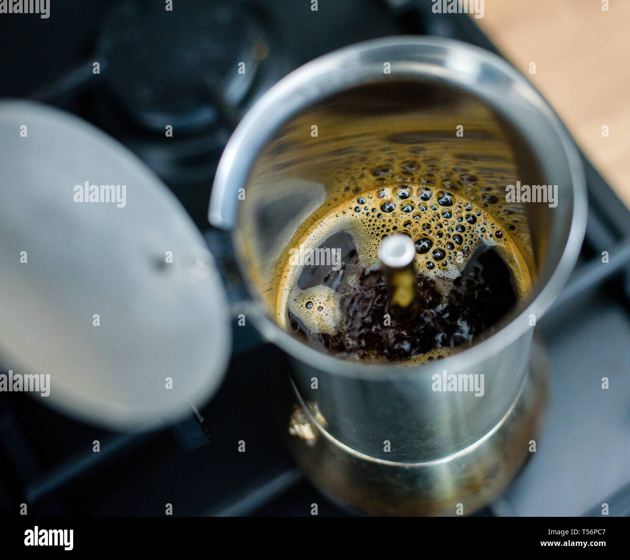 Preparing a traditional italian style coffee with coffee percolator