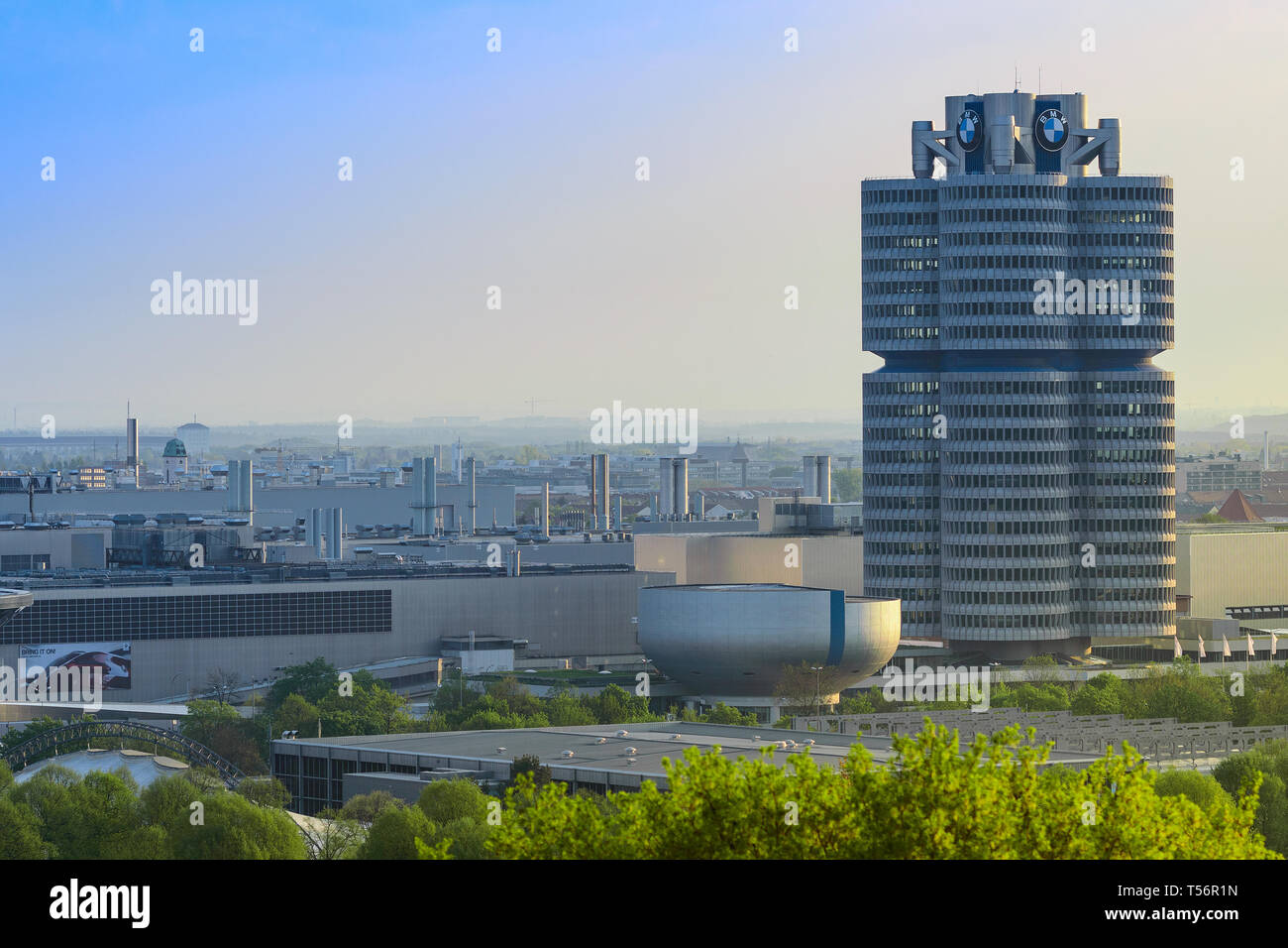 Munich, Germany - April 22, 2018: BMW Headquarters office tower, manufacturing plants and industrial facility of Bavarian automaker. Stock Photo