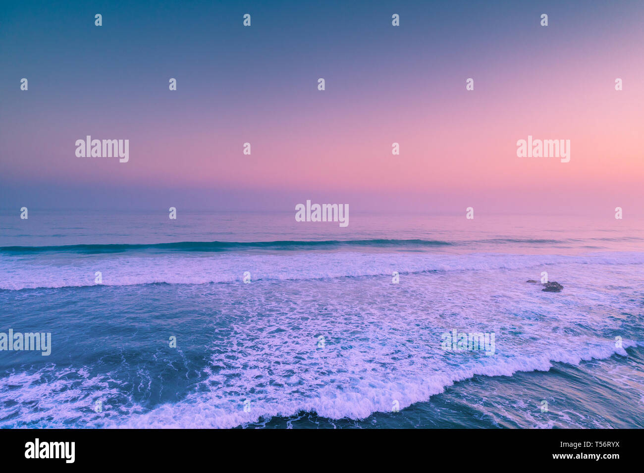 Beautiful sunrise over the ocean Stock Photo - Alamy
