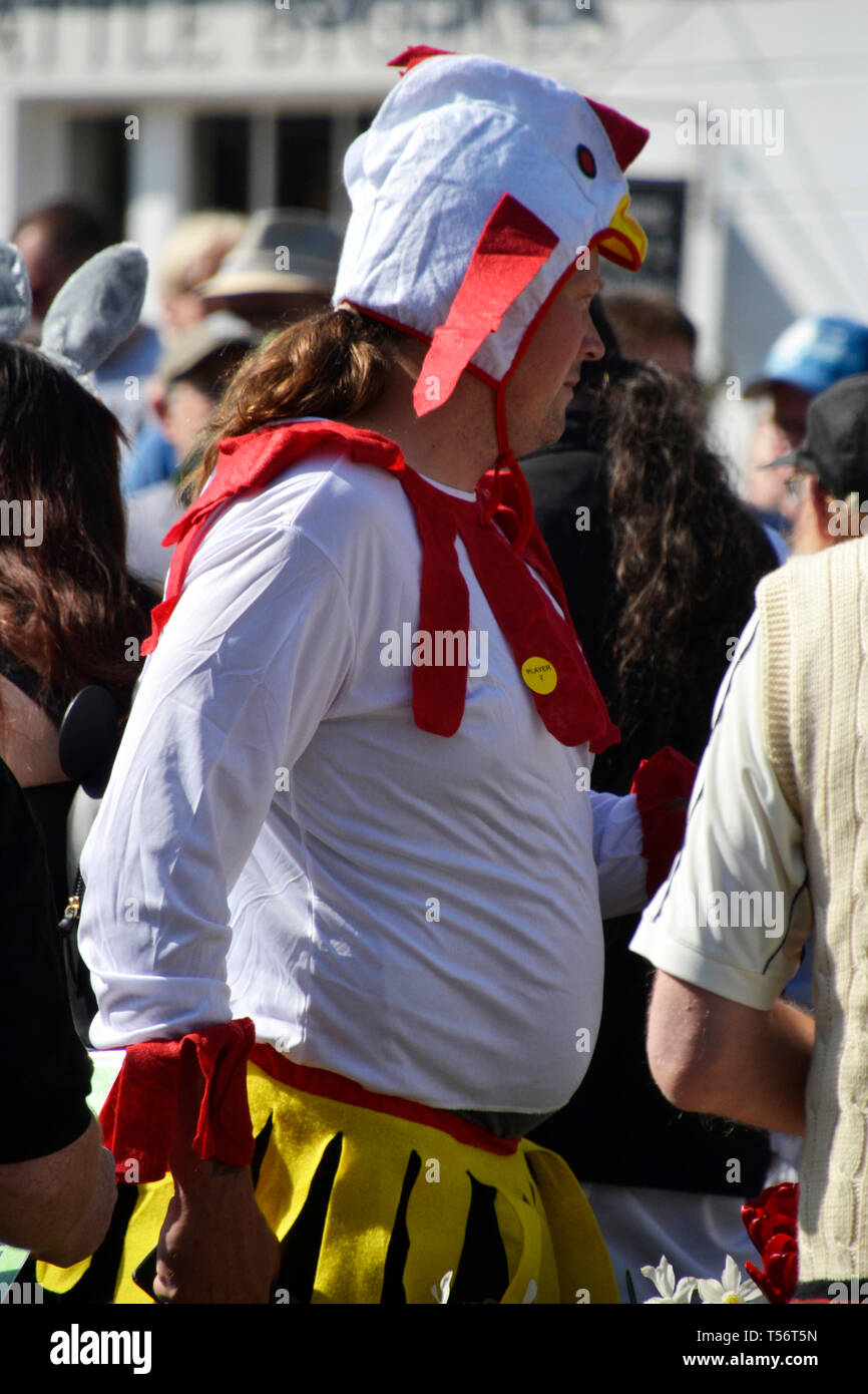 Teams taking part in the annual Good Friday Marbles Competition in fancy dress in Battle Market Square, Battle, East Sussex, UK Stock Photo