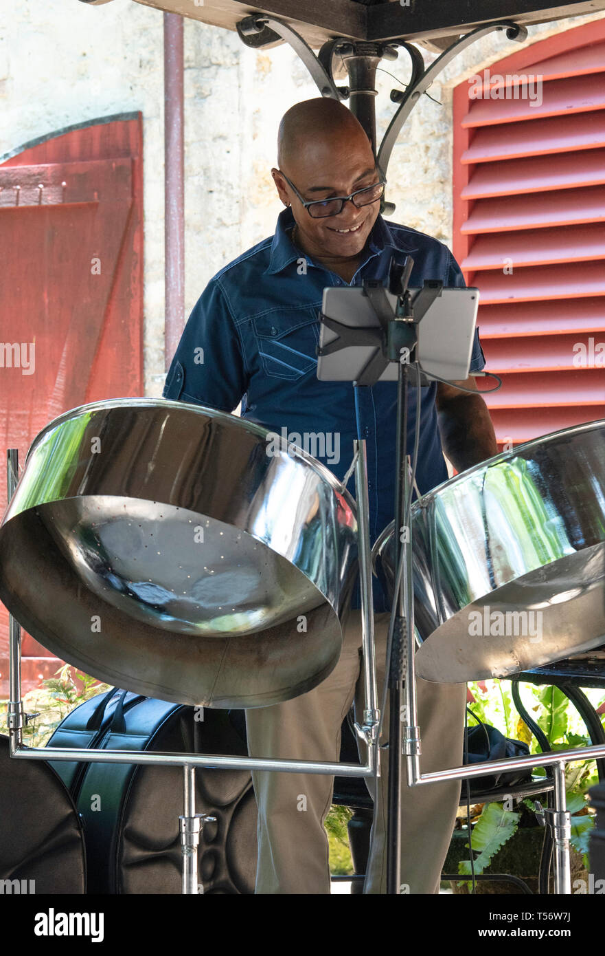 Steel Drum Player at St Nicholas Abbey in Saint Peter, Barbados Stock Photo
