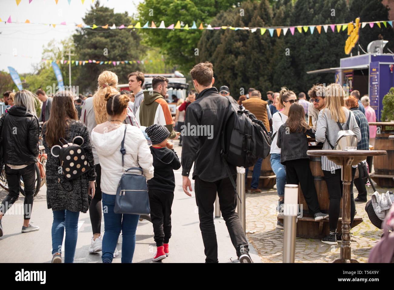 Bucharest, Romania: 21.04.2019 - Street Food Truck festival. Close up of people walking around at a street food festival in the search for the perfect lunch. Weekend outdoors activities Stock Photo