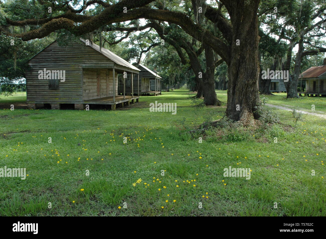 Wallace, Louisiana, USA - 2019: Slave cabins at Evergreen Plantation, located on the west side of the Mississippi River in St John the Baptist Parish. Stock Photo