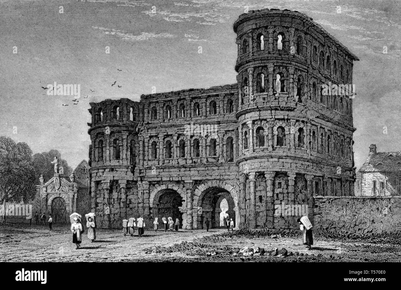 Treves - Print shows a street-level view of the Porta Nigra in Trier, Germany, with several women coming and going, each with a large bundle on her back. Circa 1831 Stock Photo