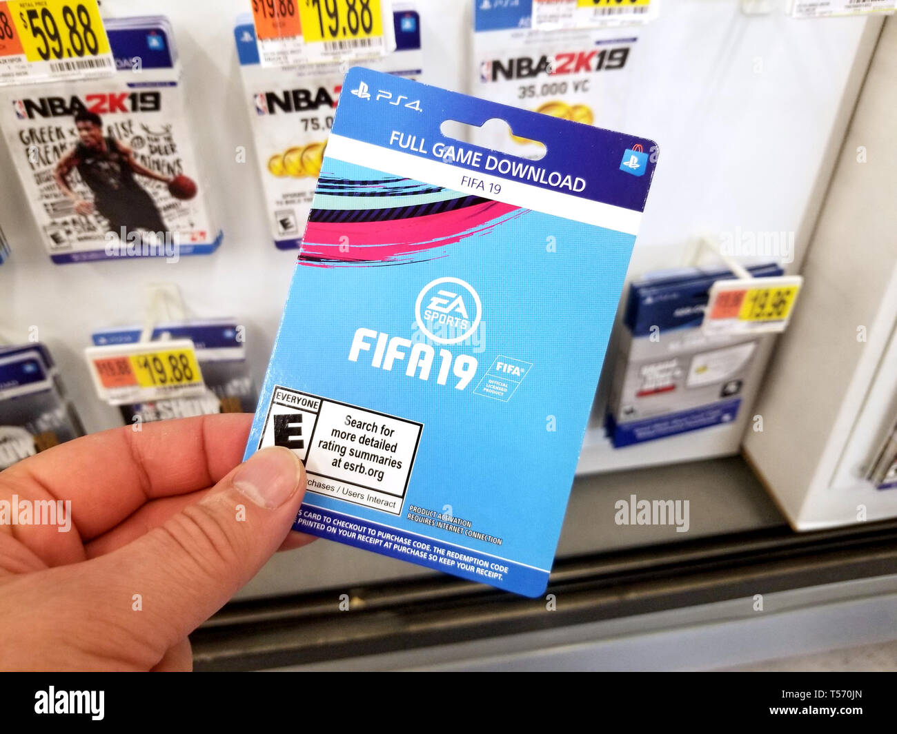 PLATTSBURGH, USA - JANUARY 21, 2019 : Full download card of Fifa 19 video  game in a hand of a buyer at Walmart store Stock Photo - Alamy