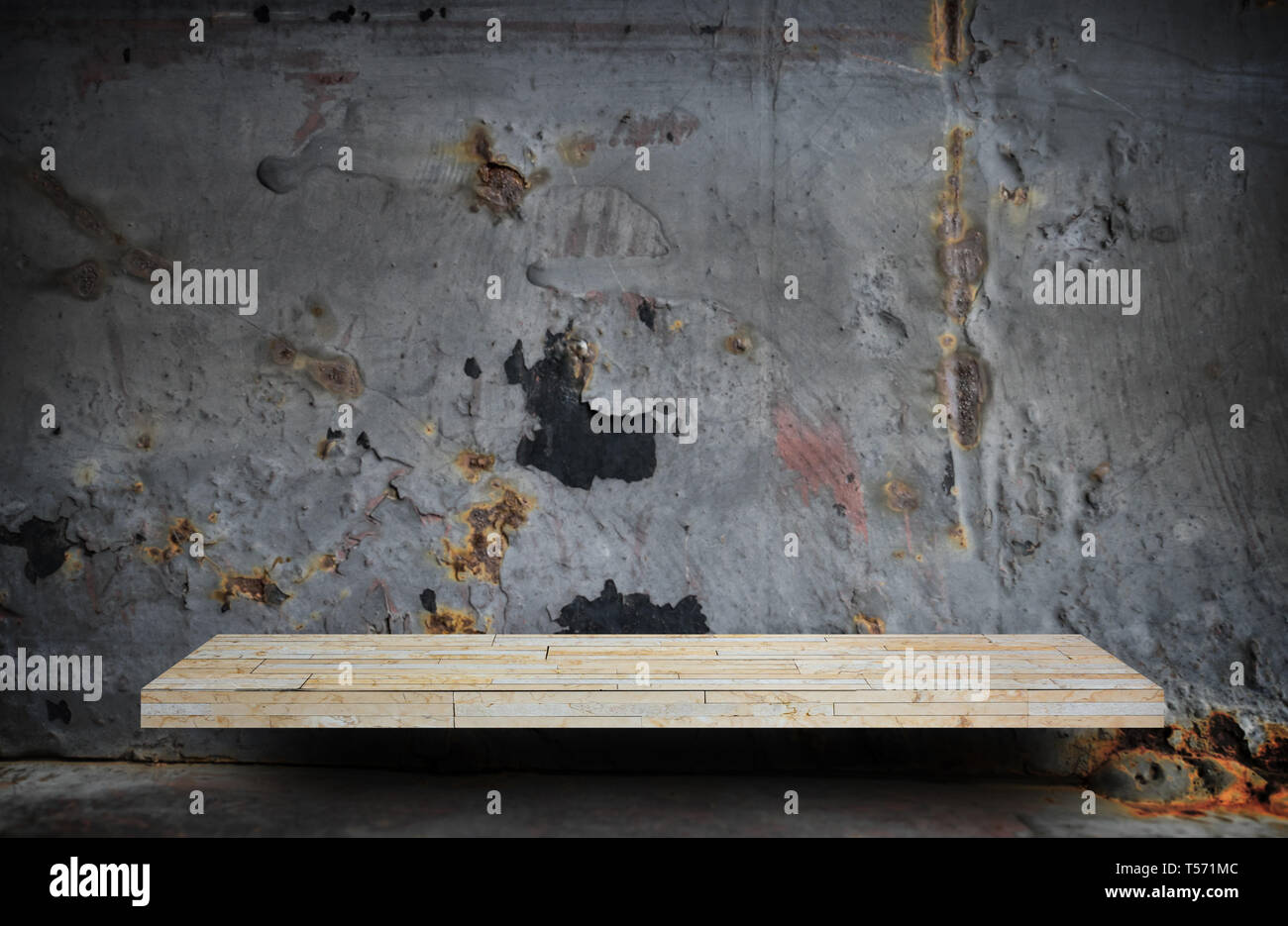 Empty stone shelf on rustic metal wall for product display Stock Photo