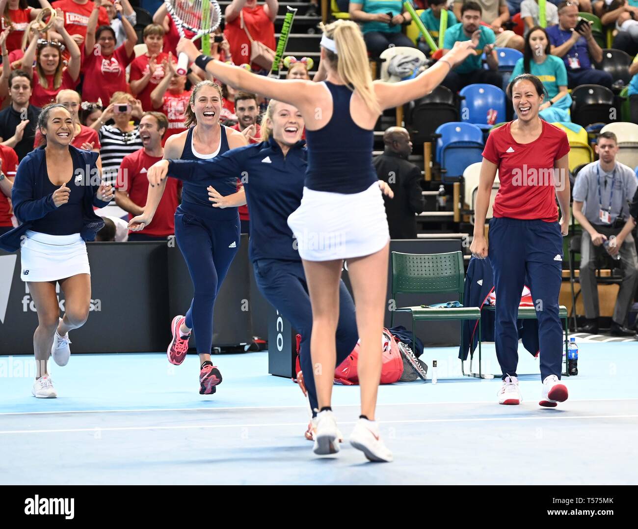 London, UK. 21st Apr 2019. The British team run on to celebrate after Katie Boulter (Great Britain) wins her match to seal victory. Rubber 4. Great Britain v Kazakhstan. World group II play-off. BNP Parebas Fed Cup. Copper Box arena. Queen Elizabeth Olympic Park. Stratford. LondonUK. 21/04/2019. Credit: Sport In Pictures/Alamy Live News Stock Photo