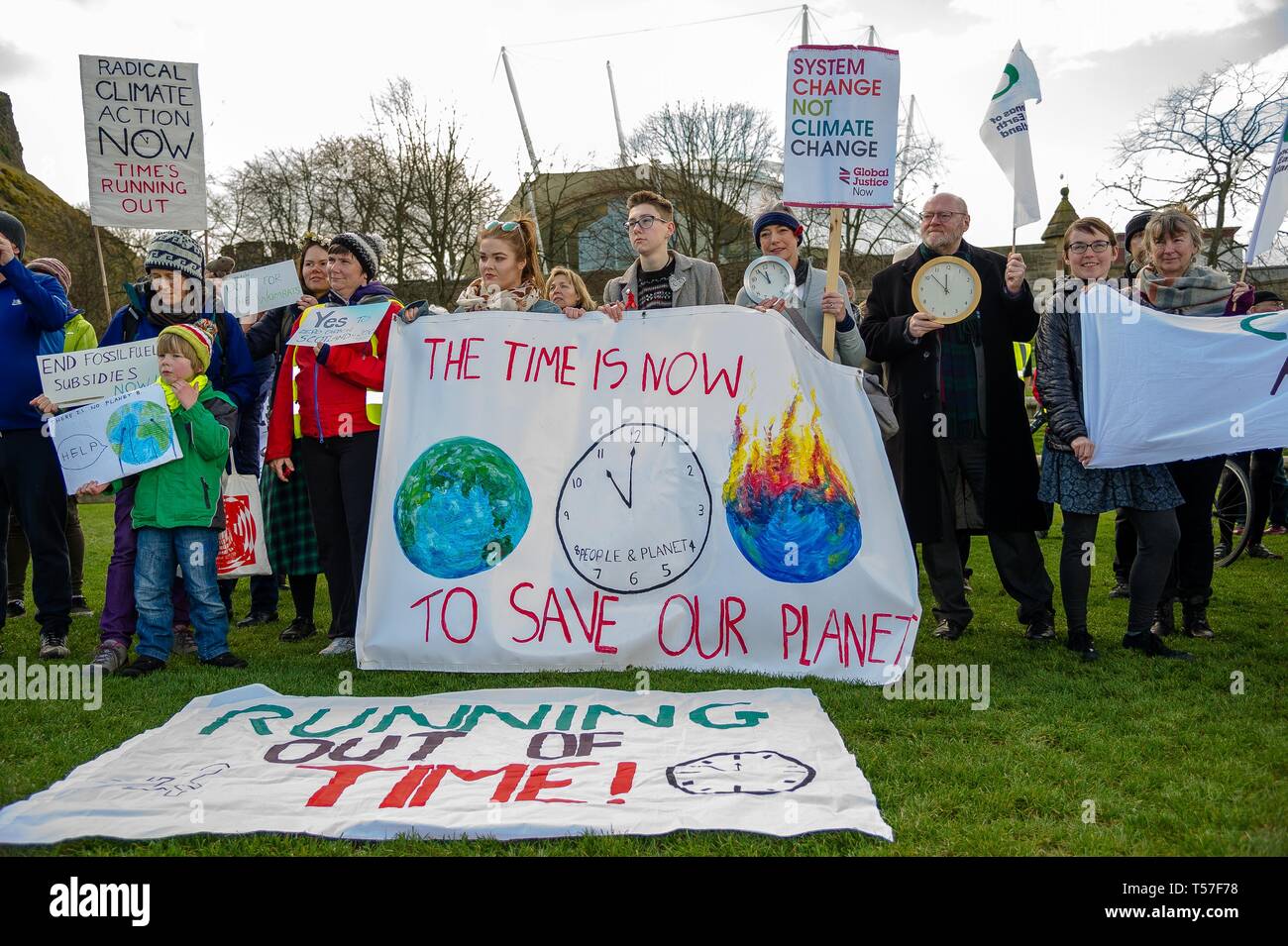 Edinburgh, Lothian, UK. 2nd Apr, 2019. Protesters seen holding banners, placards and clocks during the demonstration.Environmental campaigners staged a protest outside of the Scottish Parliament to call on Members of Scottish Parliament for greater urgency in tackling climate change. The theme of the protest was ''Running out of Time'', Members of Scottish Parliament were debating on a new law that would shape the climate plans for the coming decades. Credit: Stewart Kirby/SOPA Images/ZUMA Wire/Alamy Live News Stock Photo