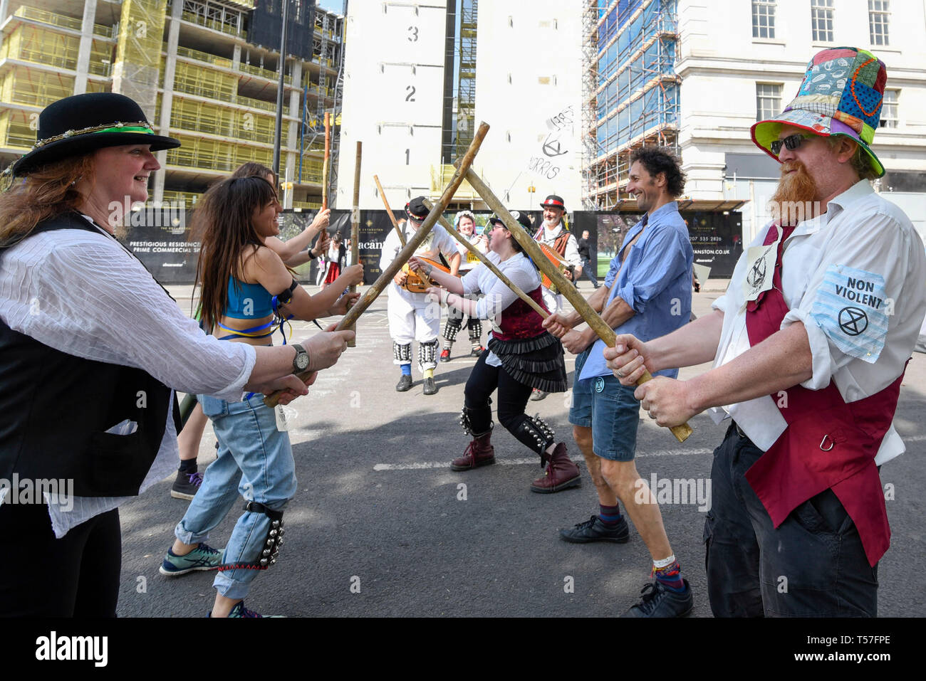 London, UK.  22 April 2019.  Morris dancing activists at Marble Arch during 'London: International Rebellion', on day eight of a protest organised by Extinction Rebellion.  Protesters are demanding that governments take action against climate change.  After police issued section 14 orders at the other protest sites of Oxford Circus, Waterloo Bridge and Parliament Square resulting in over 900 arrests, protesters have convened at the designated site of Marble Arch so that the protest can continue into its second week.  Credit: Stephen Chung / Alamy Live News Stock Photo