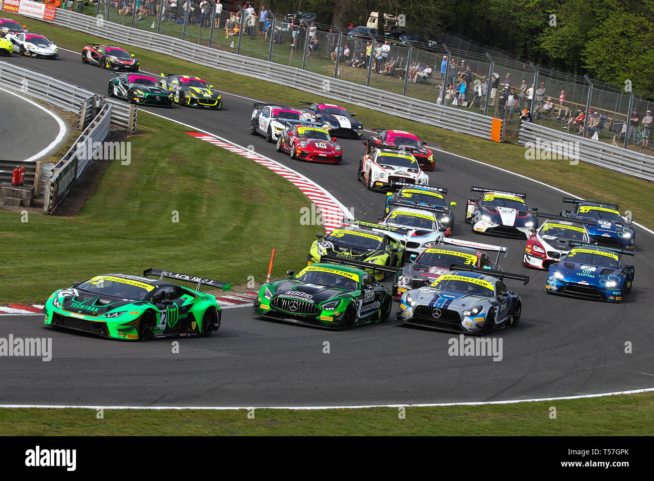 Taporley, Cheshire, UK. 22nd Apr, 2019. Barwell Motorsport Lamborghini Huracan GT3 EVO with Pro/Am drivers Phil Keen & Adam Balon leads into the first corner at the start of race 2 during the British GT Championship Oulton Park at  Oulton Park, Tarporley, England on 22 April 2019. Photo by Jurek Biegus.  Editorial use only, license required for commercial use. No use in betting, games or a single club/league/player publications. Credit: UK Sports Pics Ltd/Alamy Live News Stock Photo