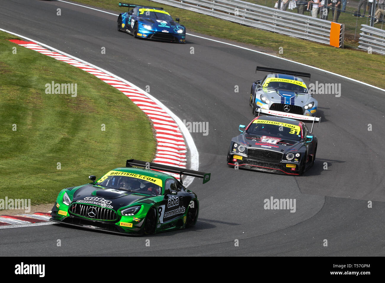 Taporley, Cheshire, UK. 22nd Apr, 2019. Team ABBA Racing Mercedes-AMG GT3 with Pro/Am drivers Adam Christodoulou & Richard Neary* leads JRM Racing Bentley Continental GT3 with Pro/Am drivers Seb Morris & Rick Parfitt Jnr during the British GT Championship Oulton Park at  Oulton Park, Tarporley, England on 22 April 2019. Photo by Jurek Biegus.  Editorial use only, license required for commercial use. No use in betting, games or a single club/league/player publications. Credit: UK Sports Pics Ltd/Alamy Live News Stock Photo
