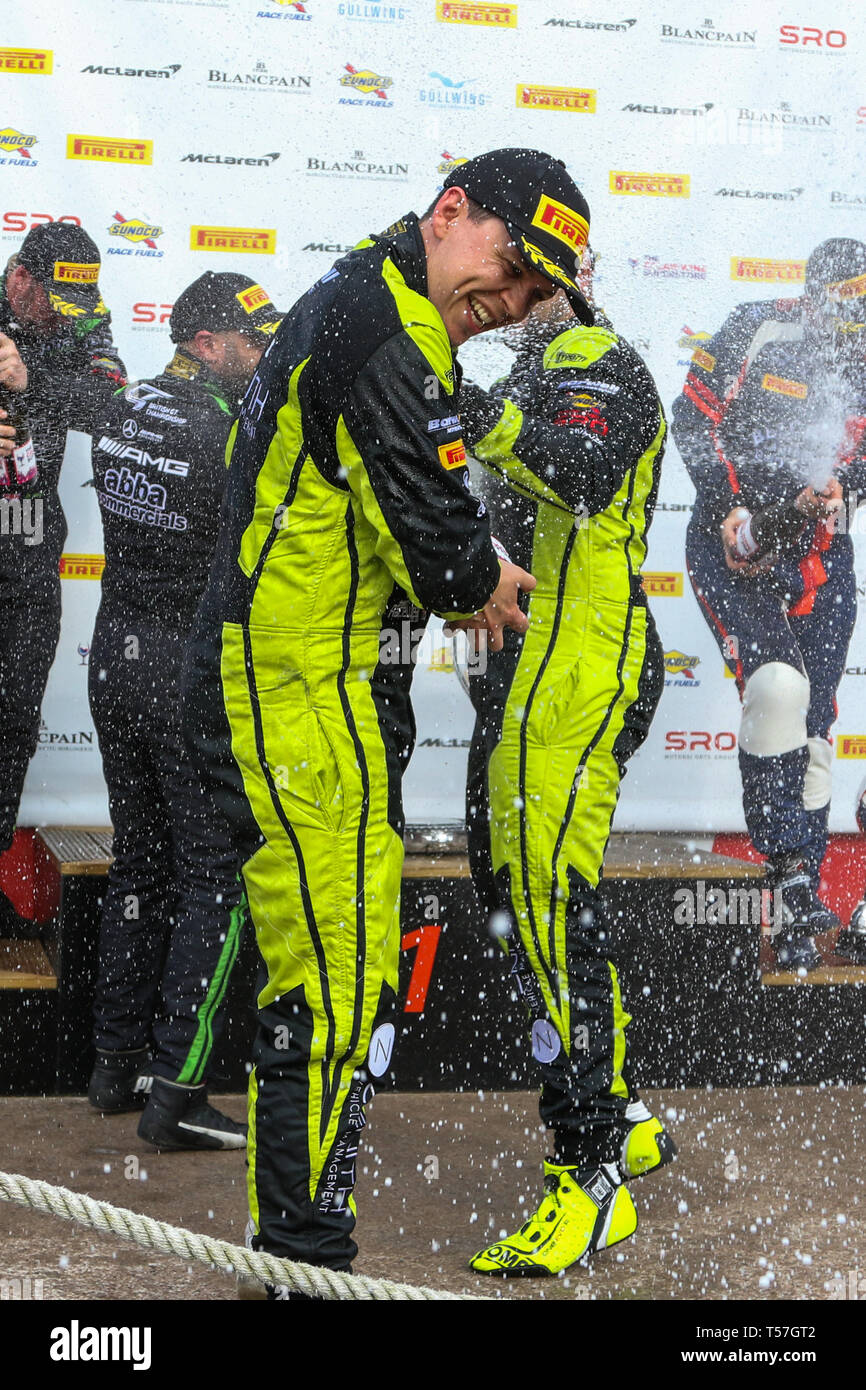 Taporley, Cheshire, UK. 22nd Apr, 2019. Barwell Motorsport drivers Jonny Cocker & Sam De Haan celebrate victory on the podium during the British GT Championship Oulton Park at  Oulton Park, Tarporley, England on 22 April 2019. Photo by Jurek Biegus.  Editorial use only, license required for commercial use. No use in betting, games or a single club/league/player publications. Credit: UK Sports Pics Ltd/Alamy Live News Stock Photo