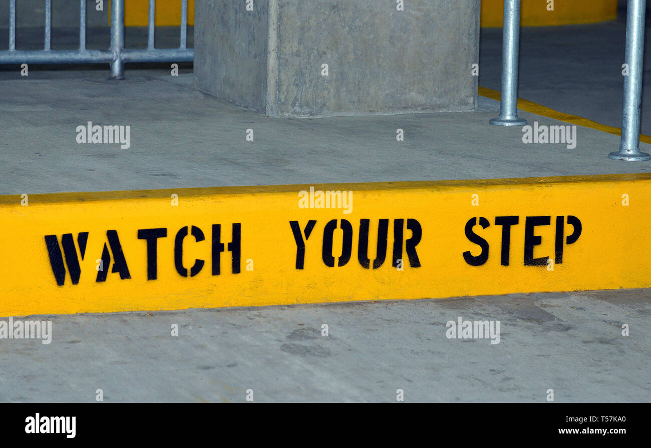 Watch your step safety warning Stock Photo