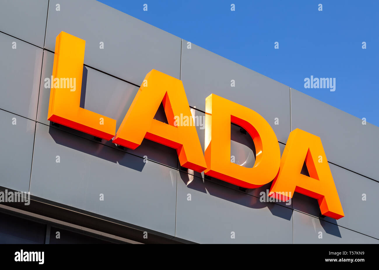 Samara, Russia - April 20, 2019: Lada dealership sign on the office of official dealer. Lada is a Russian automobile manufacturer Stock Photo