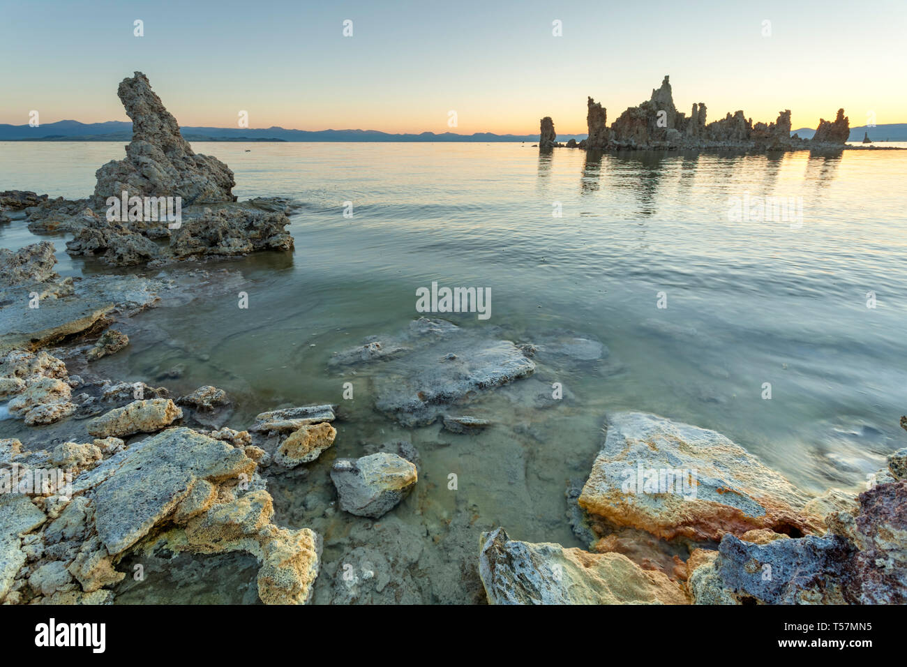 The surreal landscape of Mono Lake, Mono County, California. Where limestone tufa towers were created by past receding water levels, which have now be Stock Photo