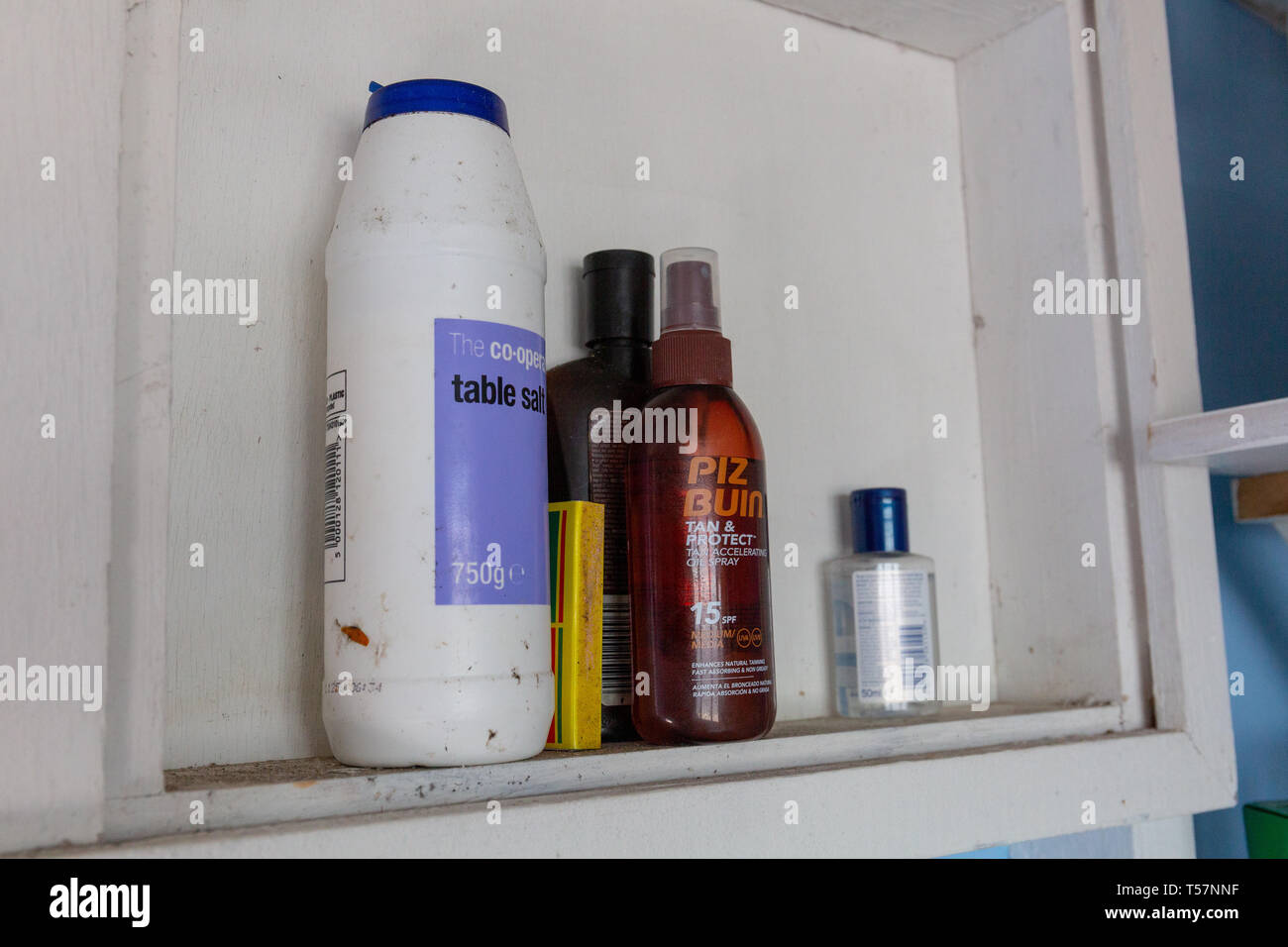 Sun tan lotion on a shelf Stock Photo Alamy