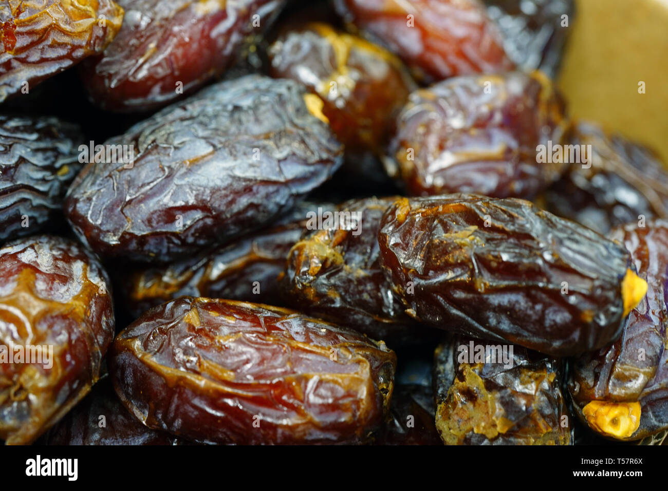 Dried sweet dates in bulk at a food market Stock Photo Alamy