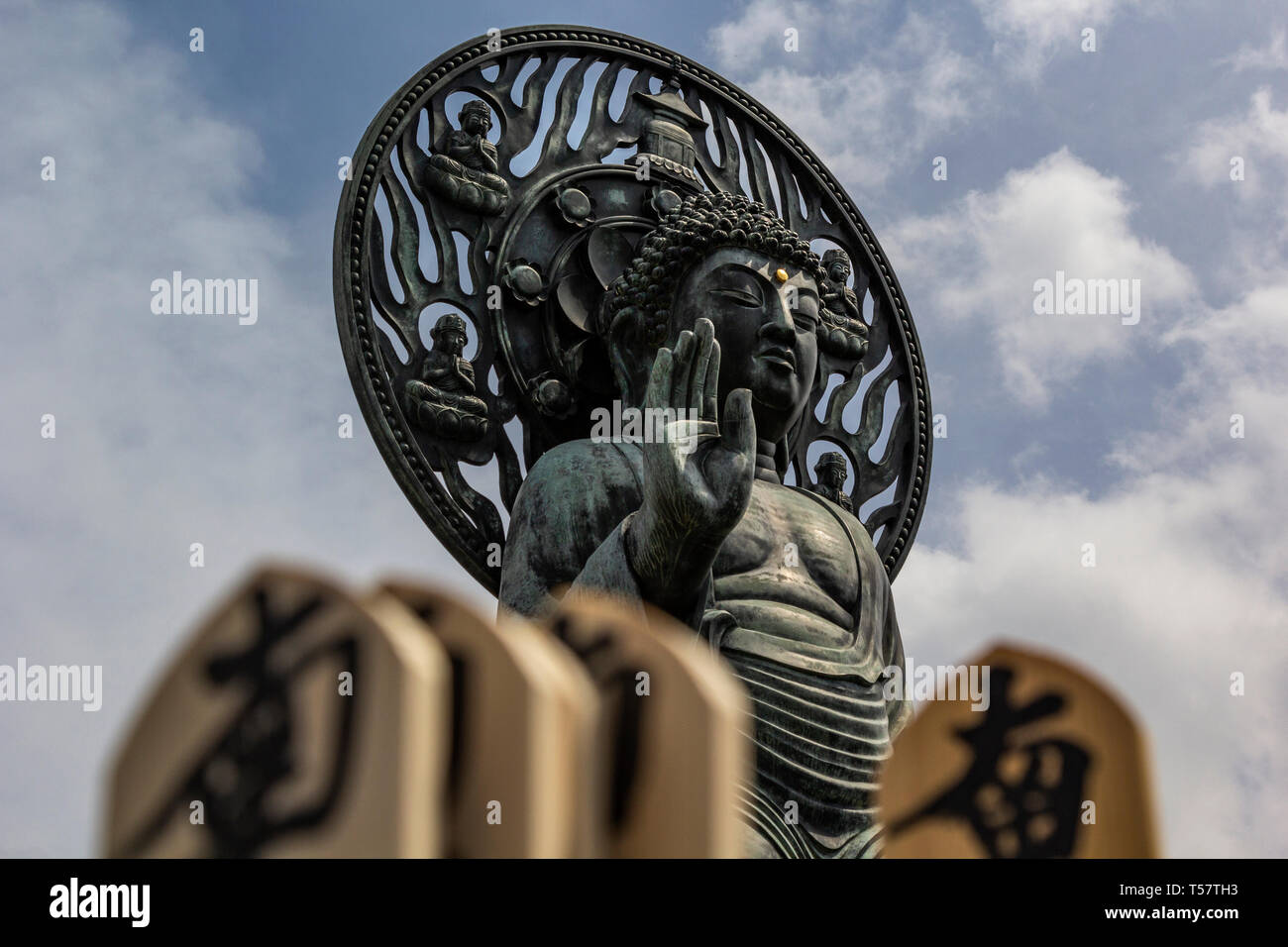 Myohoji Rotating Buddha - Myohoji is a Buddhist Temple of the Nichiren sect, most famous for its unique rotating Buddha.  This bronze Buddha is surpri Stock Photo
