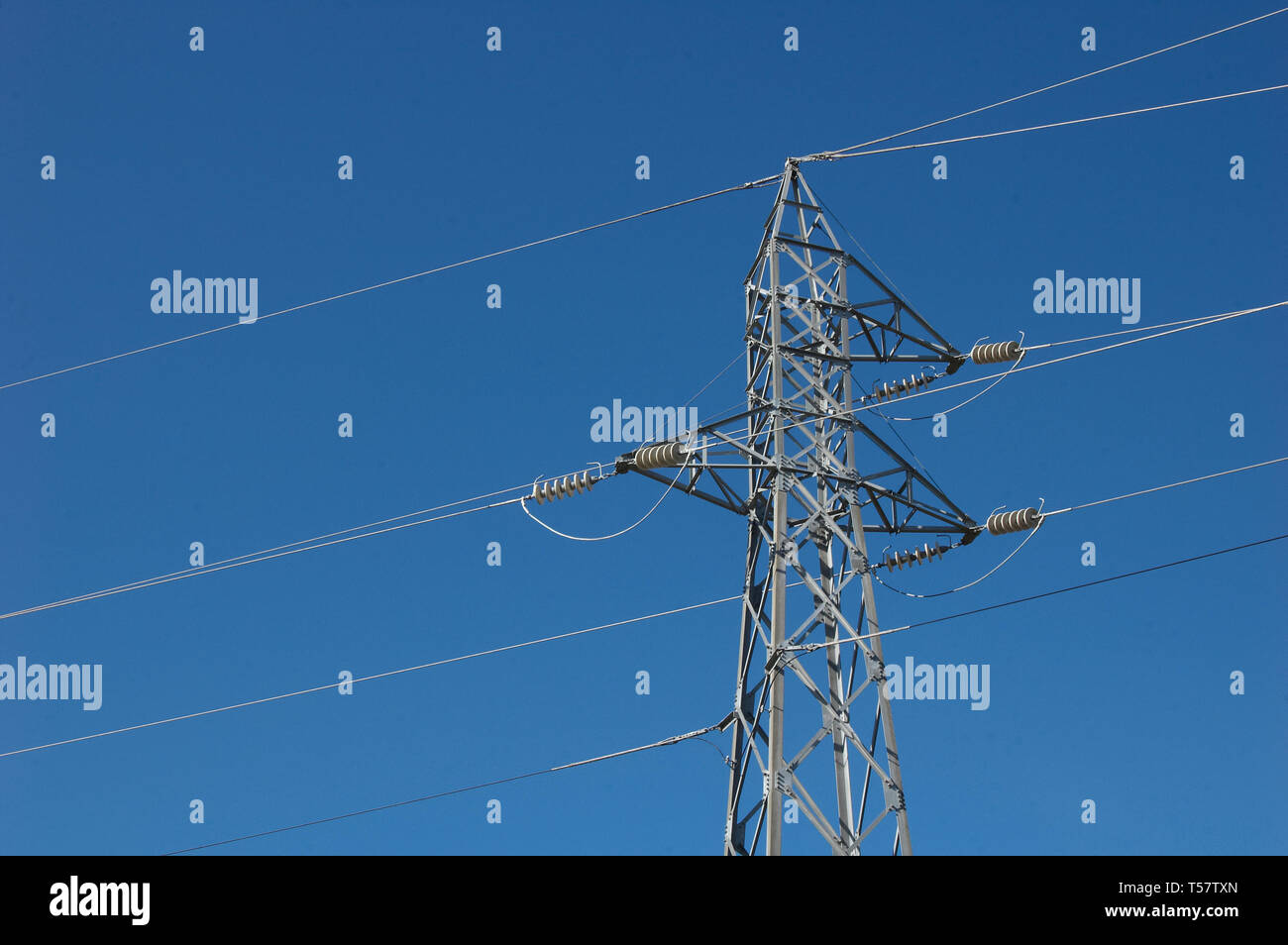 This image shows a power line tower Stock Photo - Alamy