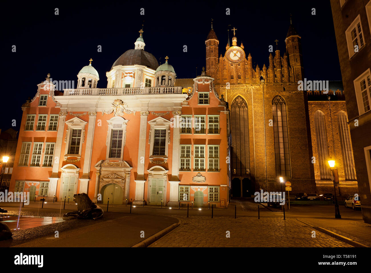 Baroque Royal Chapel and St. Mary Church at night in city of Gdansk in Poland. Stock Photo