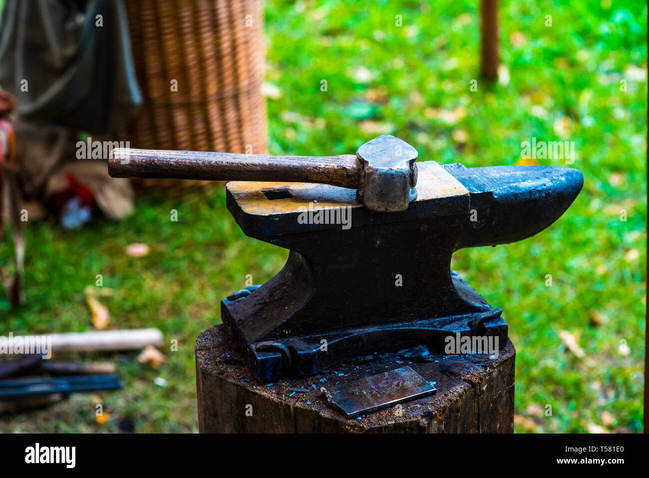 A hammer on an anvil. The tool uses a blacksmith in a blacksmith shop