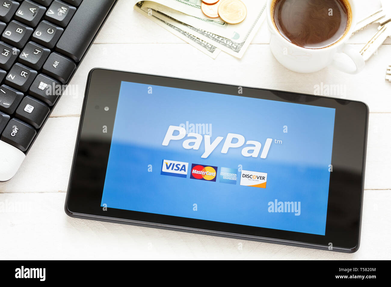 KIEV, UKRAINE - June 9: PayPal payment system logo on tablet, in Kiev, Ukraine, on June 9, 2014. Stock Photo