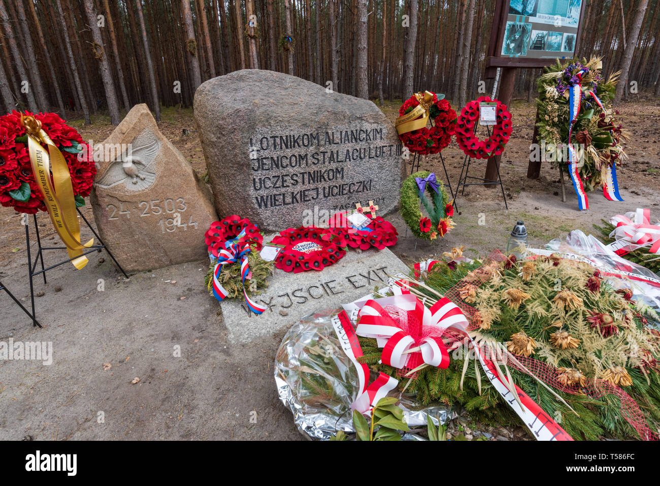 Wreaths marking the exit of tunnel Harry dug by POWs under Stalag Luft III camp at Sagan, made famous by the the film 'The Great Escape' Stock Photo