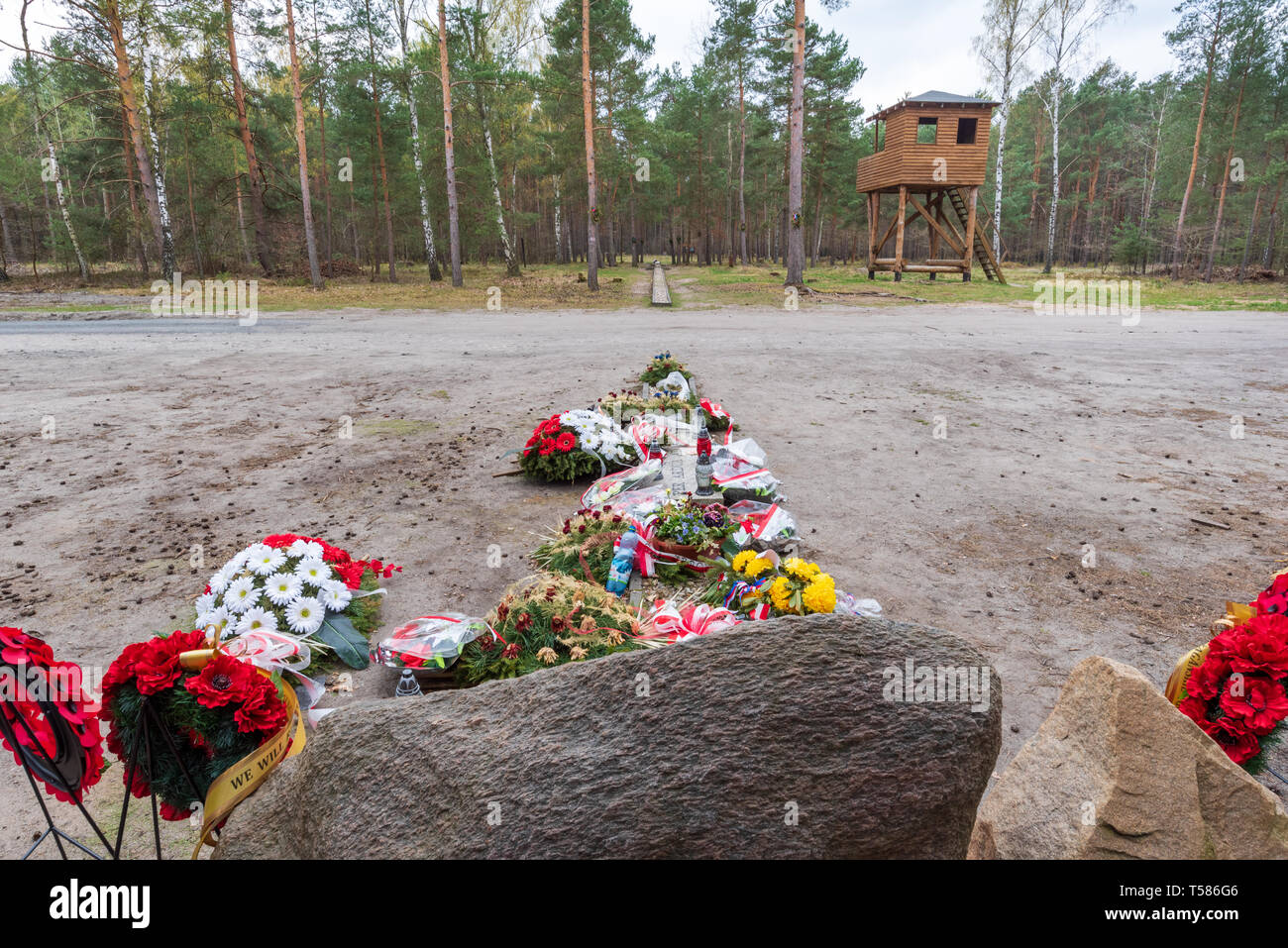 Wreaths marking the exit of tunnel Harry dug by POWs under Stalag Luft III camp at Sagan, made famous by the the film 'The Great Escape' Stock Photo