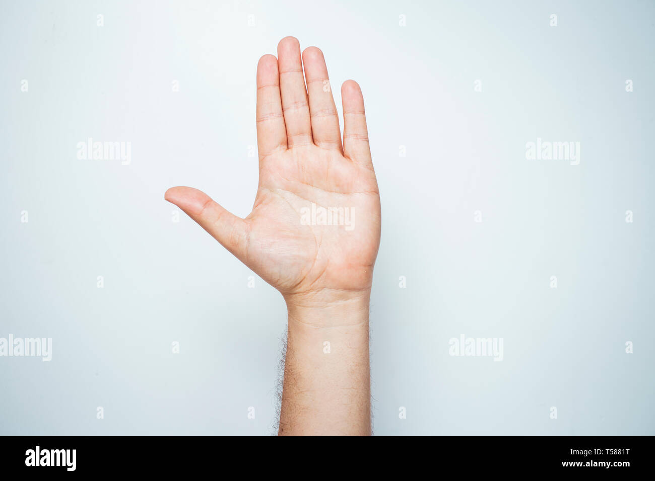 Male hand showing stop close up hi-res stock photography and images - Alamy