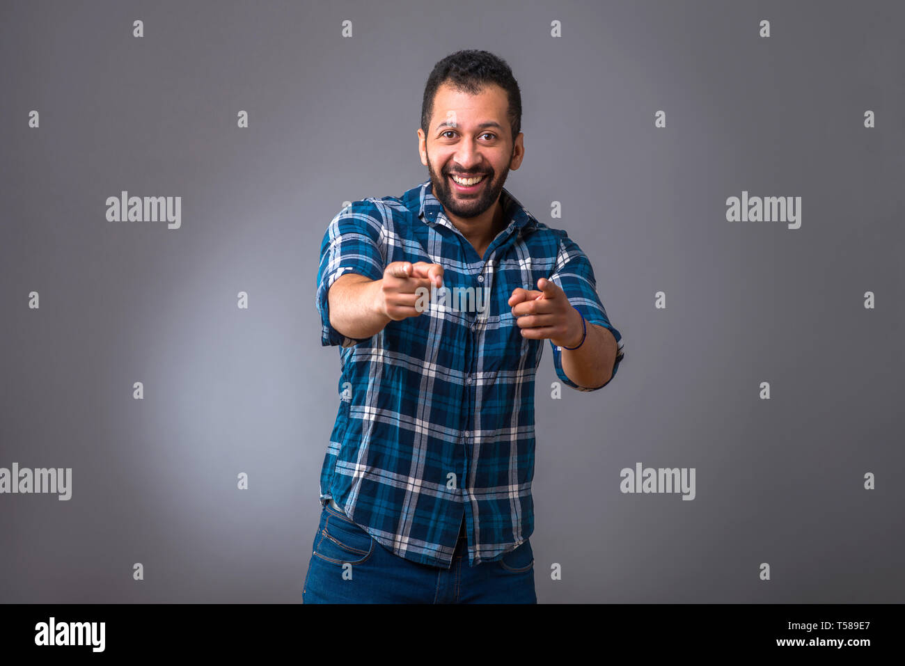 Guy pointing at camera hi-res stock photography and images - Alamy