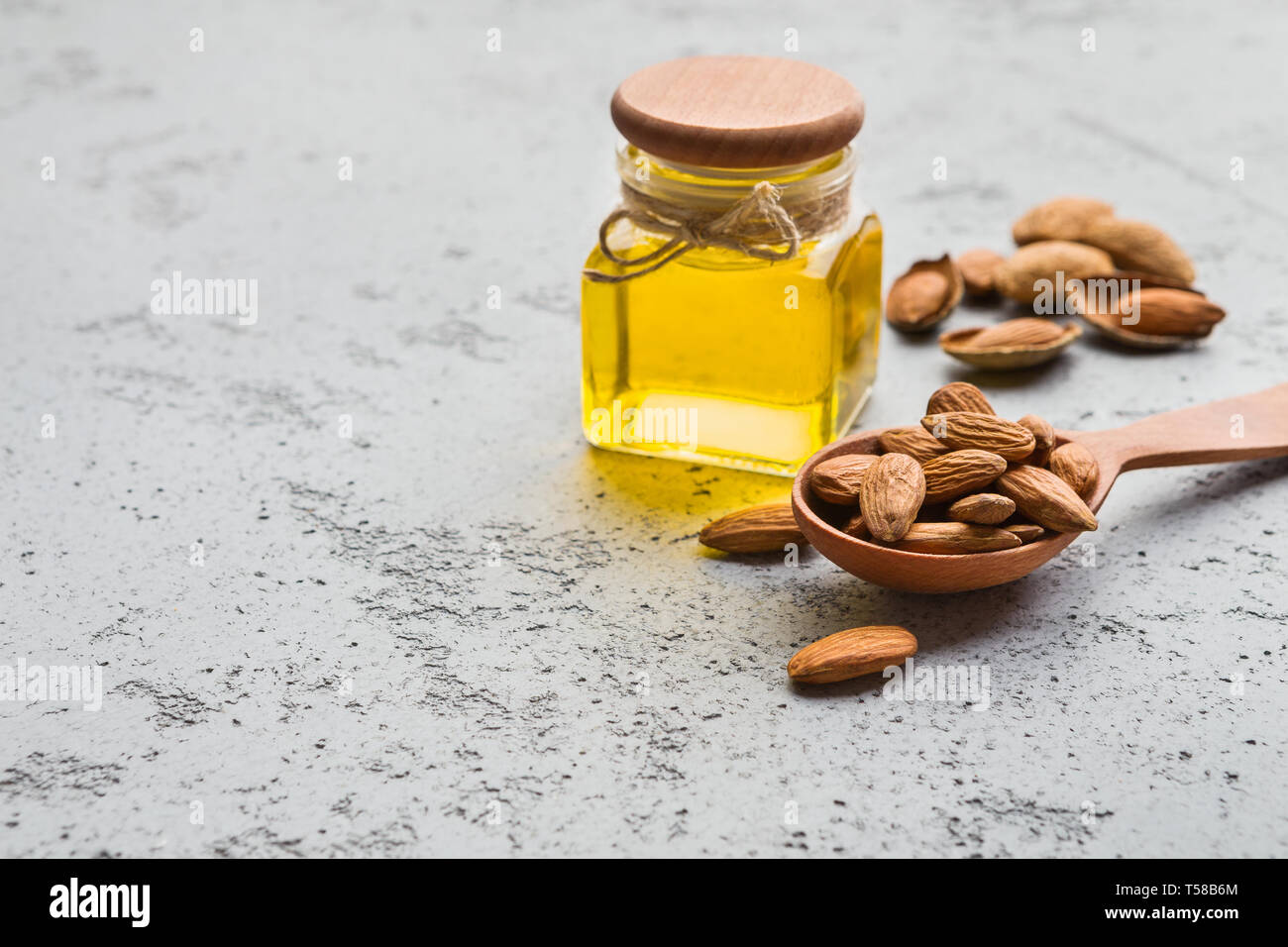 Almond oil health benefits concept Stock Photo Alamy
