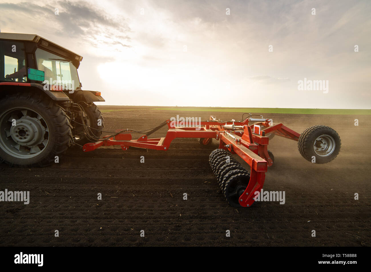 Tractors Plowing Stubble Fields Stock Photo Alamy