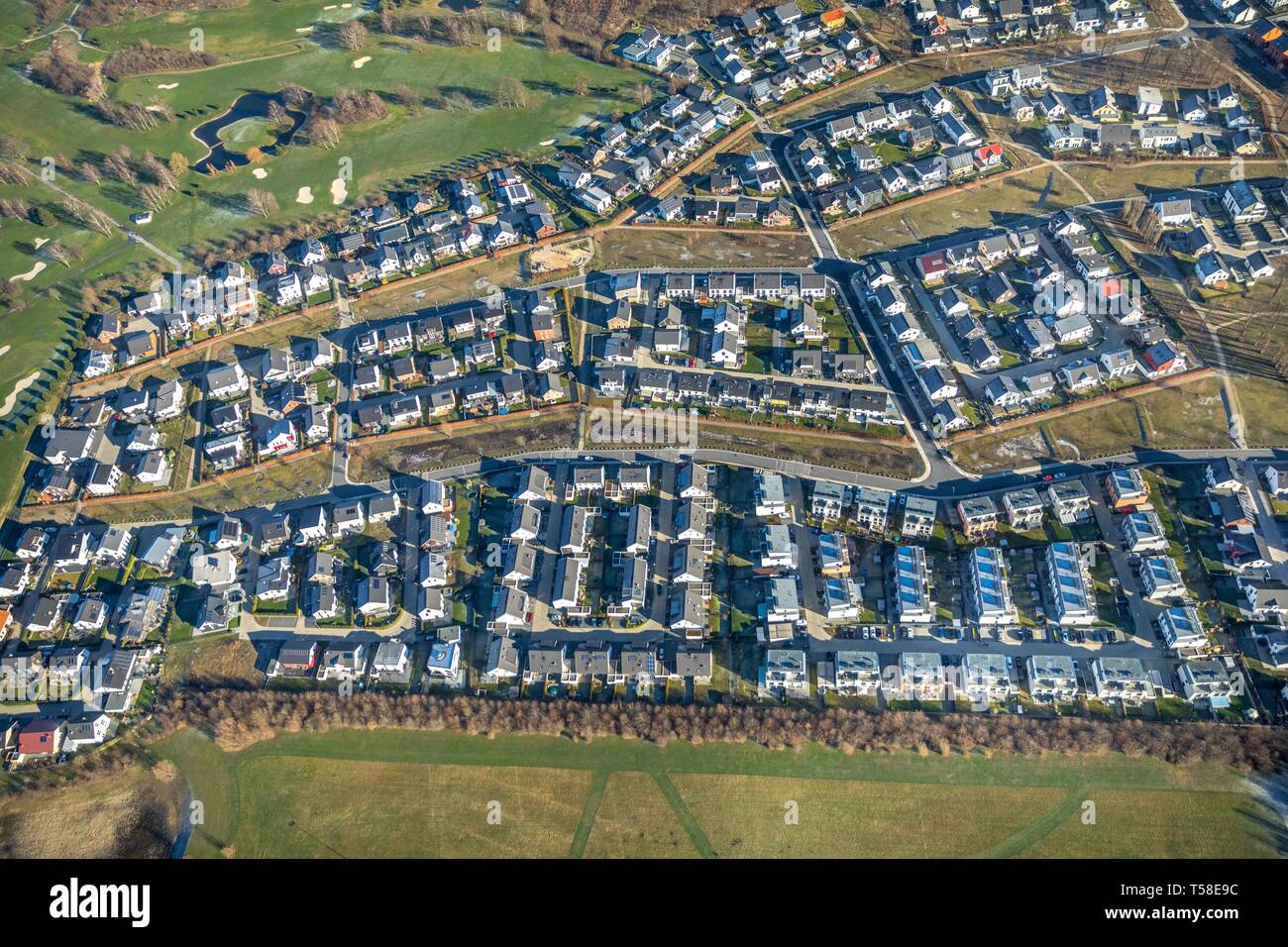 Aerial view, residential area, detached houses, residential property, new housing estate, golf course, Am Brackeler Ostholz, Willi-Daume-Strasse Stock Photo
