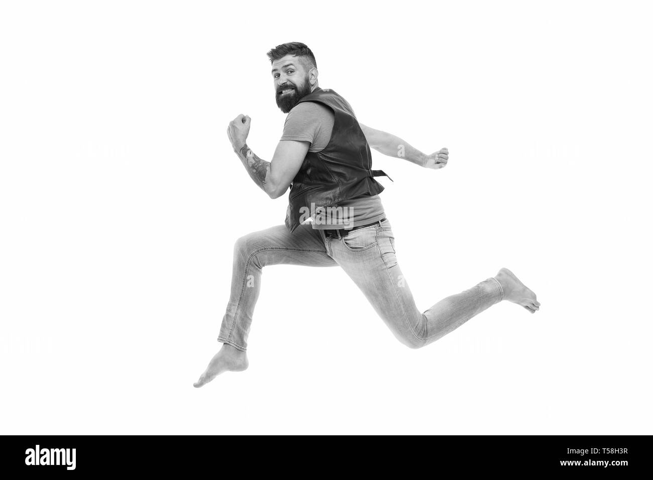Never stop. Man thief run away. Keep moving concept. Guy bearded hipster captured in running motion isolated on white background. Bearded man running high speed. Escape and runaway. Running motion. Stock Photo