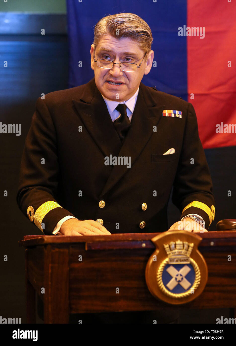 Commodore Mike Utley, commander UK carrier strike group, makes a speech