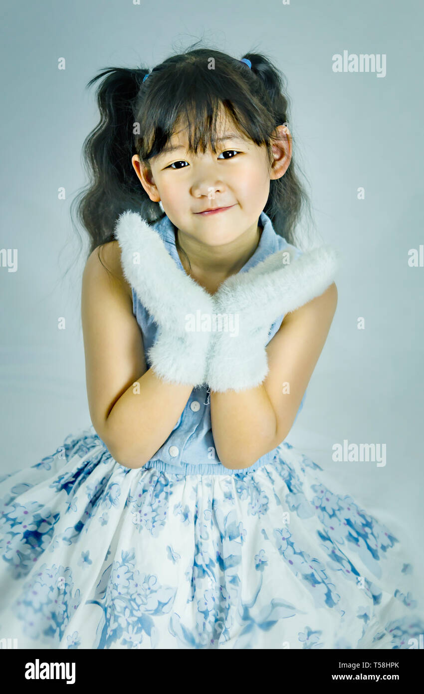 portrait of asian little girl in blue and white dress Stock Photo - Alamy