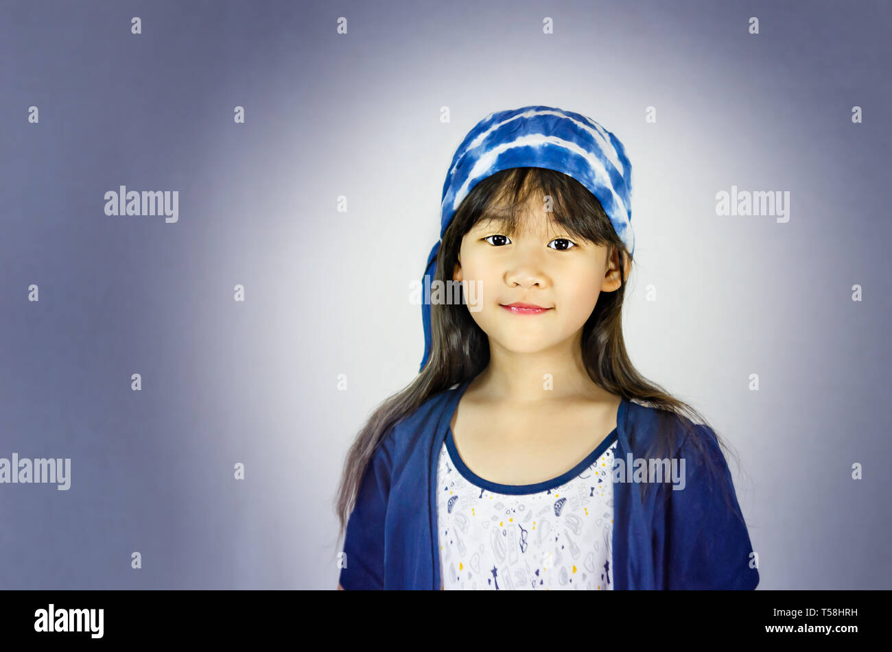 portrait of asian little girl in blue and white dress Stock Photo - Alamy